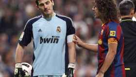 Iker Casillas y Carles Puyol en un Clásico