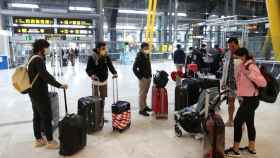 Turistas en el aeropuerto de Barajas, en Madrid.