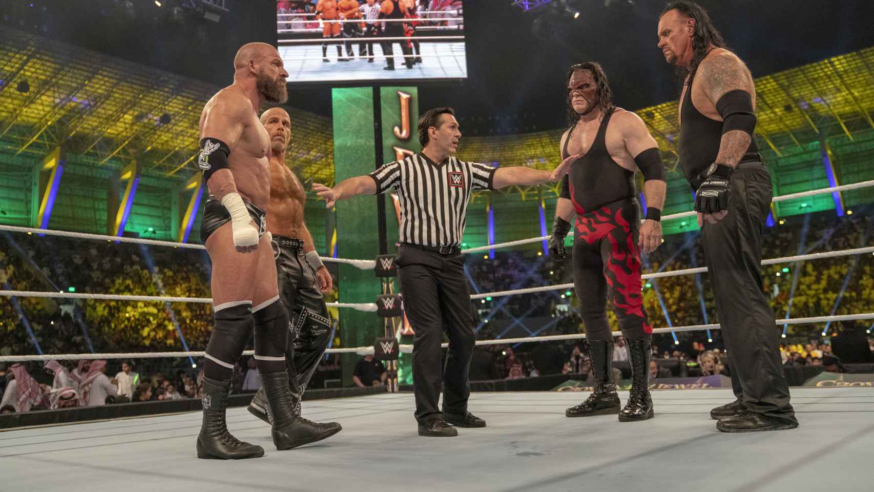 Triple H y Shawn Michaels con Kane y Undertaker