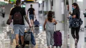 Viajeros a su llegada al Aeropuerto de Palma de Mallorca.