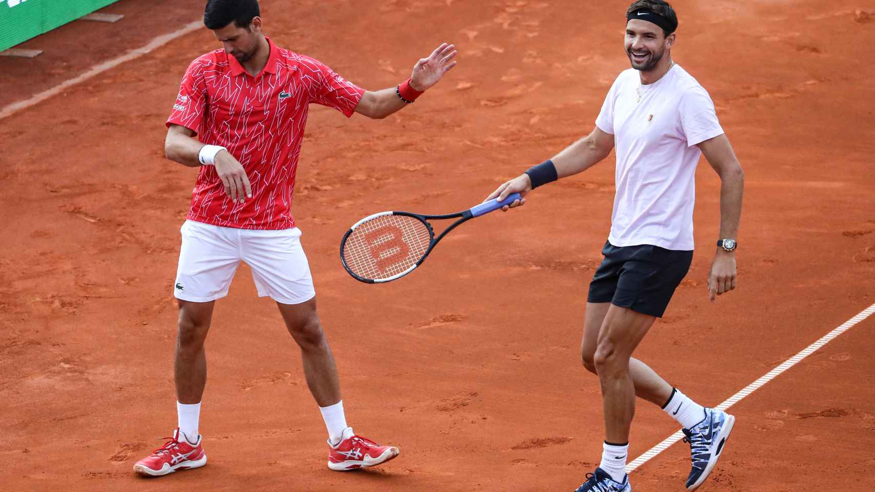 Djokovic y Dimitrov, durante un partido de dobles en el Adria Tour