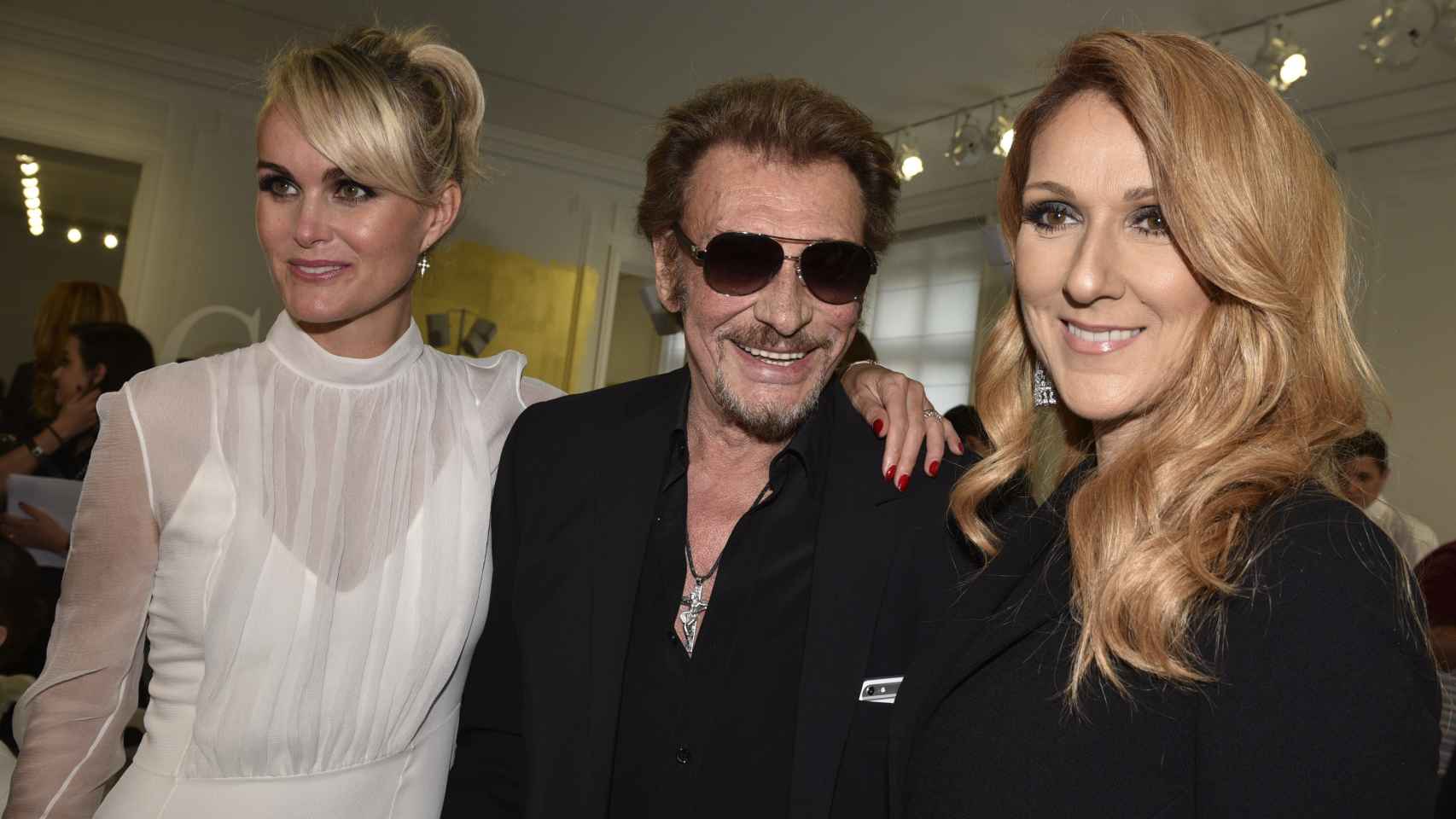 Johnny Hallyday junto a su mujer Laeticia y la cantante Celine Dion.