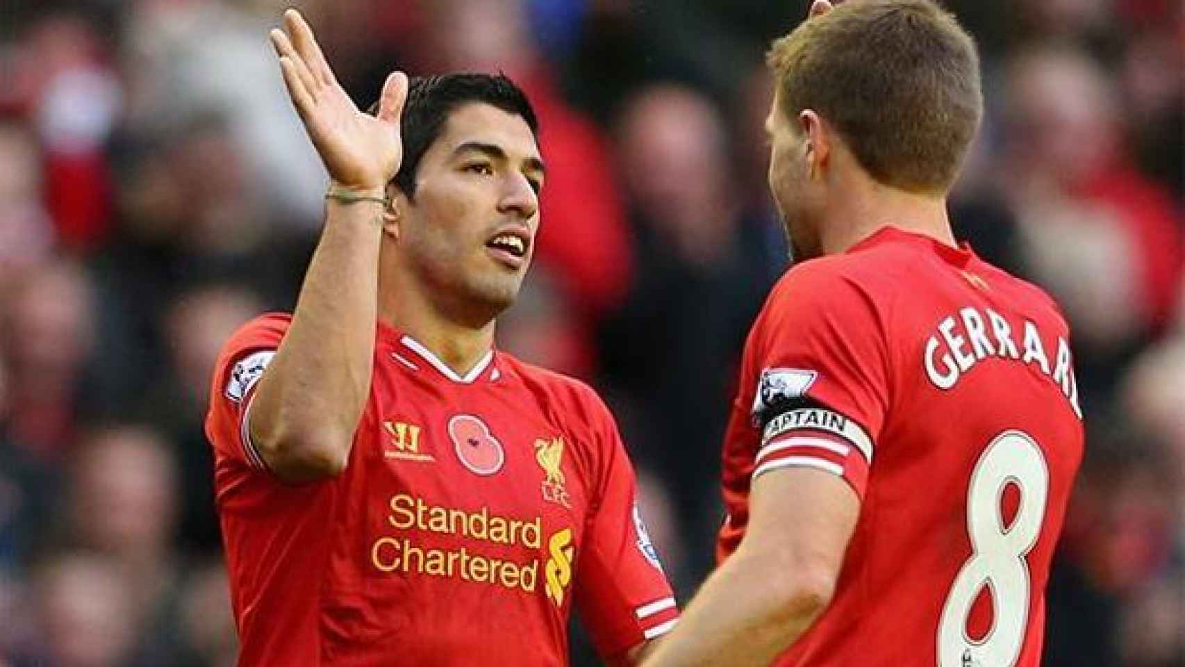 Luis Suárez, junto a Gerrard en el Liverpool