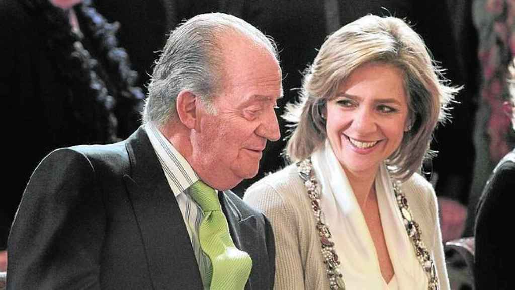 El rey Juan Carlos junto a su hija, la infanta Cristina.