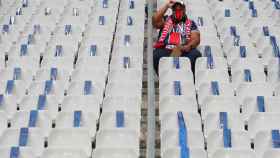 Un aficionado del PSG, en un estadio de fútbol