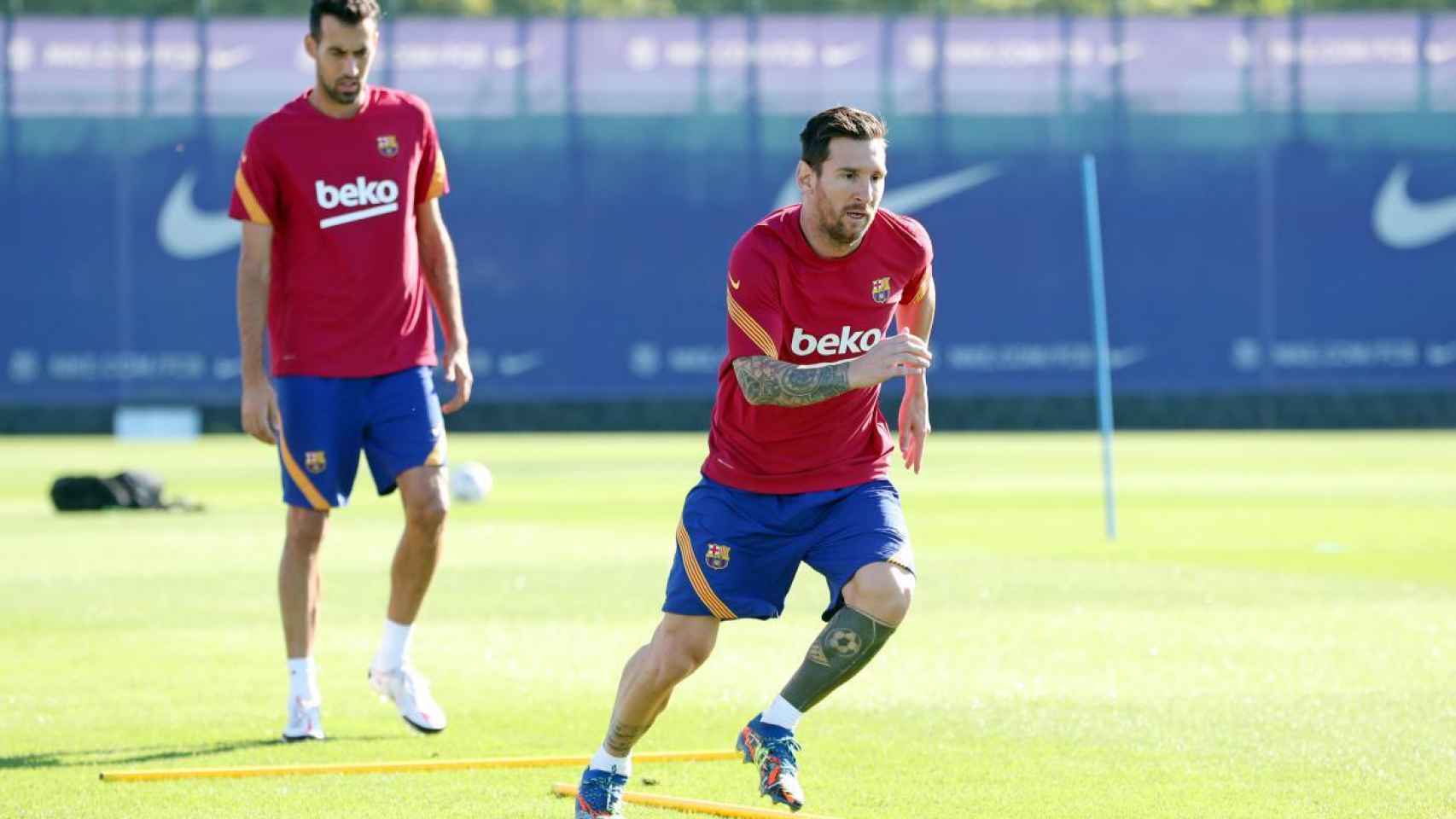 Messi y Busquets en el entrenamiento del FC Barcelona