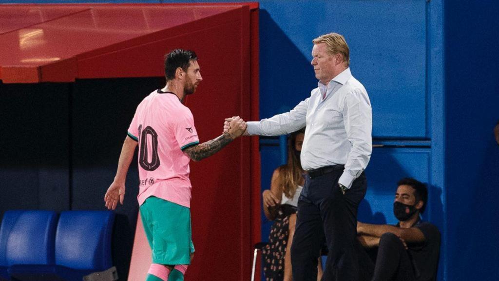 Leo Messi y Ronald Koeman, durante el amistoso ante el Girona