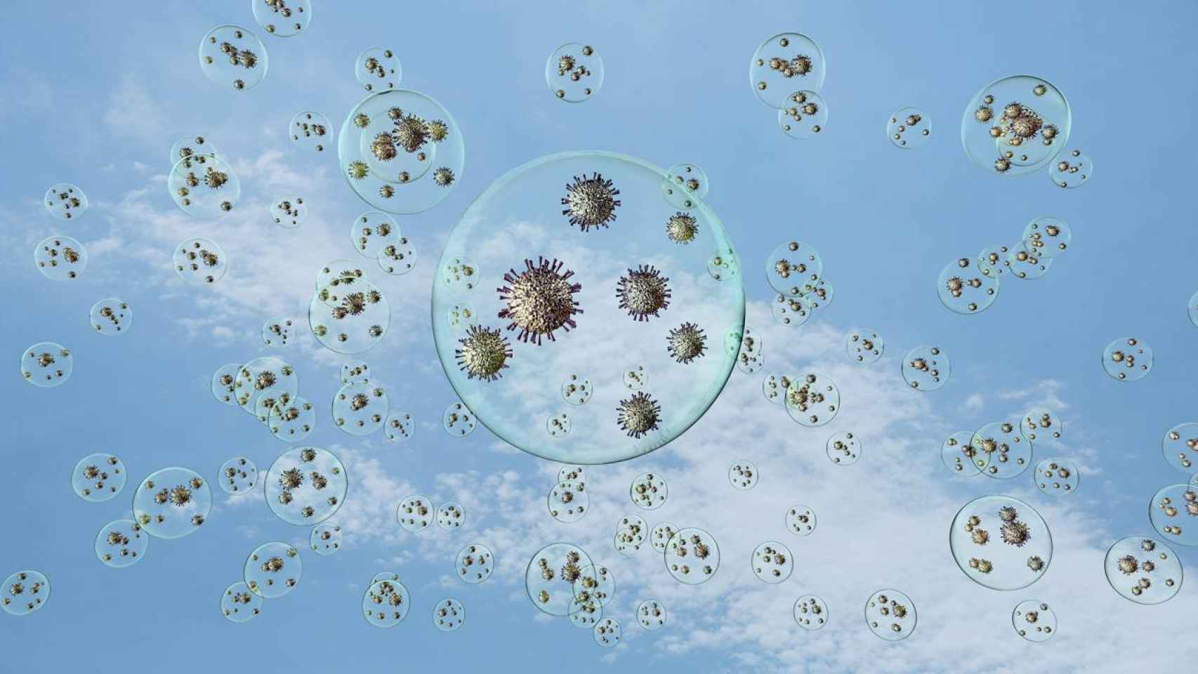 Recreación artística de coronavirus flotando en el aire dentro de gotitas, exagerando mucho el tamaño de los virus respecto al de las gotitas. En la realidad son mucho más pequeños. / Adobe Stock
