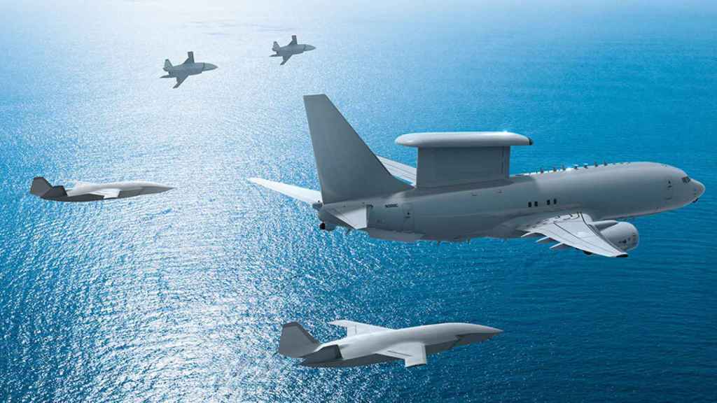 Representación de drones Boeing escoltando a avión de vigilancia