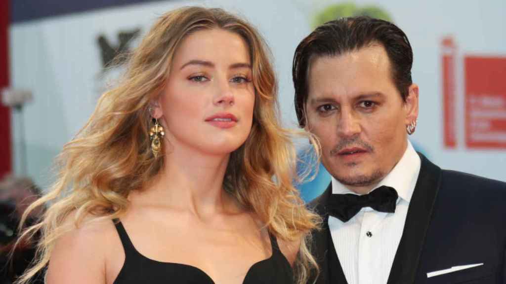Amber Heard y Johnny Depp, en el Festival de Cine de Venecia 2015.