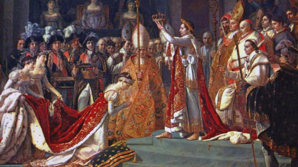 Josefina se arrodilla ante Napoleón durante su coronación en Notre Dame (1808).
