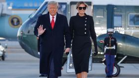Donald Trump y Melania, llegando a la base de Saint Andrews, en Maryland.