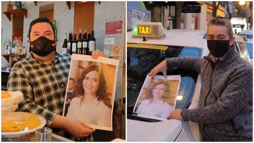 Un hostelero y un taxista posan con un retrato de la presidenta de la Comunidad de Madrid, Isabel Díaz Ayuso.