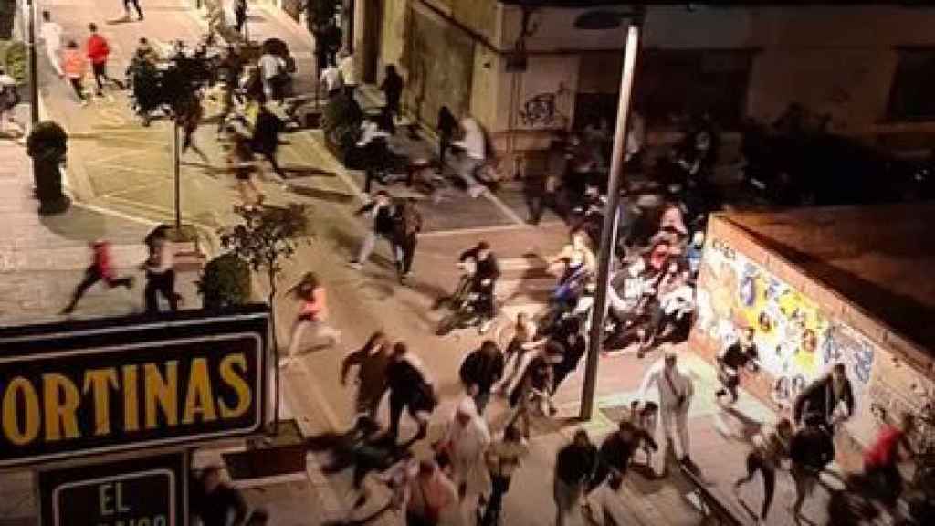 Carreras en Linares tras la aparición de los antidisturbios.