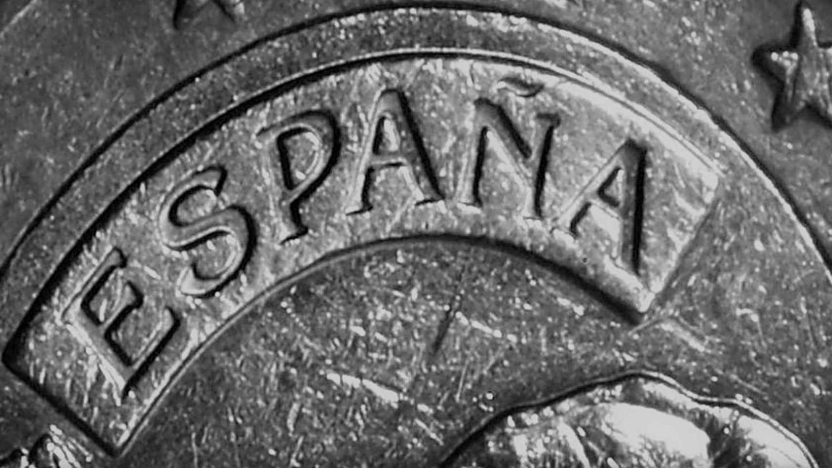 Detalle de una moneda española de un euro.