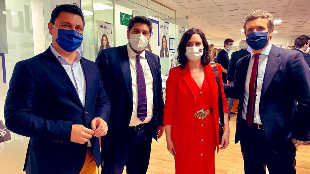 José Miguel Luengo, Fernando López Miras, Isabel Díaz Ayuso y Pablo Casado, en la jornada electoral en Madrid.