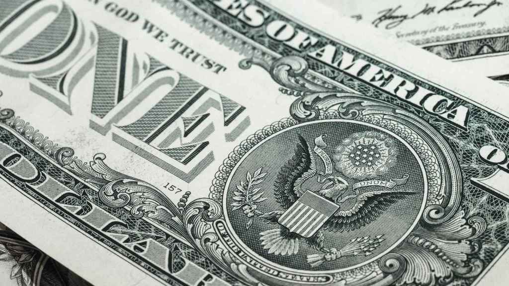 Detalle de un billete de un dólar estadounidense.