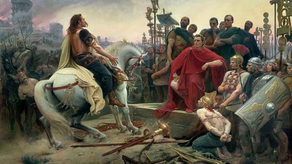 Vercingétorix arroja sus armas ante Julio César, según el pintor Lionel-Noël Royer.