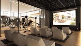 La sala de cine, junto al gimnasio, de la promoción Escalonia III de Aedas Homes en Las Rozas.