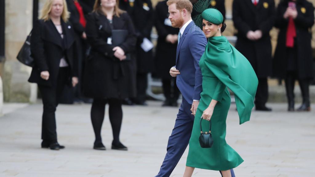 Harry y Meghan, durante uno de sus últimos actos como parte activa de la familia real británica.