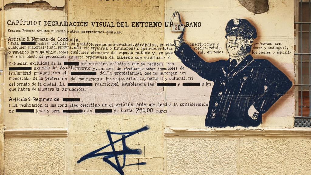Un mural sobre las normas en calle Ollerías.