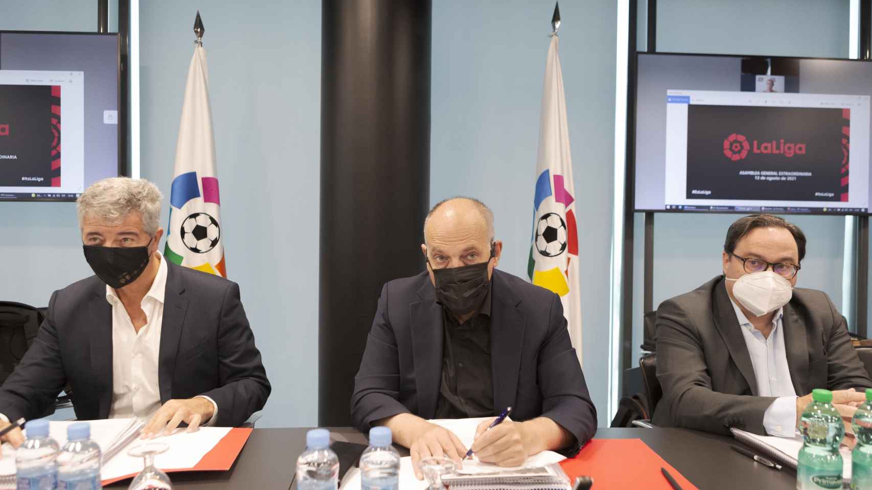 Javier Tebas, president of LaLiga, (center) together with Miguel Ángel Gil (left), first vice president of LaLiga, during the Extraordinary Assembly