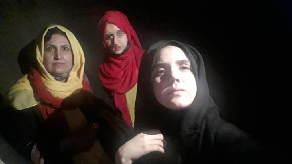 Zohra (left) and her daughter Nigin (right) at the Kabul airport, along with a friend who prefers not to identify herself.