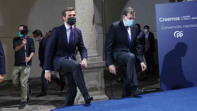 Casado y Rajoy en la convención del PP.
