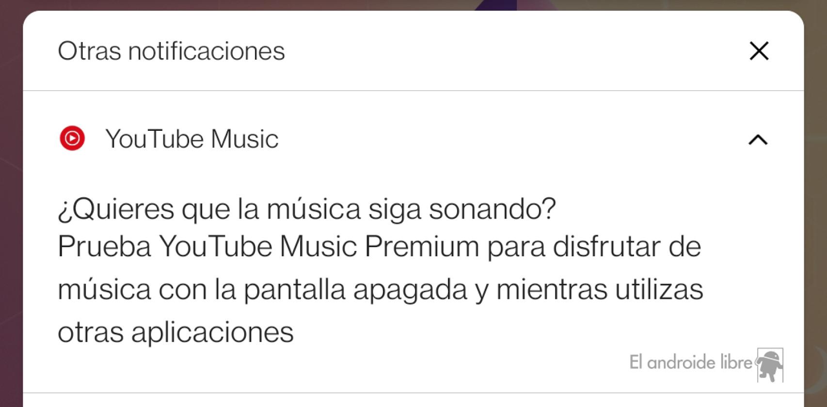 Mensaje actual de Youtube Music en su versión gratuita cuando no tenemos la app en primer plano
