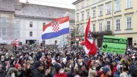 Una manifestación en contra del confinamiento een Austria