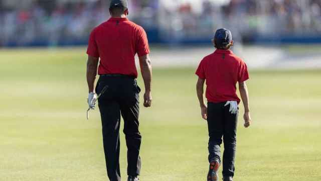 Charlie y Tiger Woods, en el PNC Championship de golf en su edición de 2021