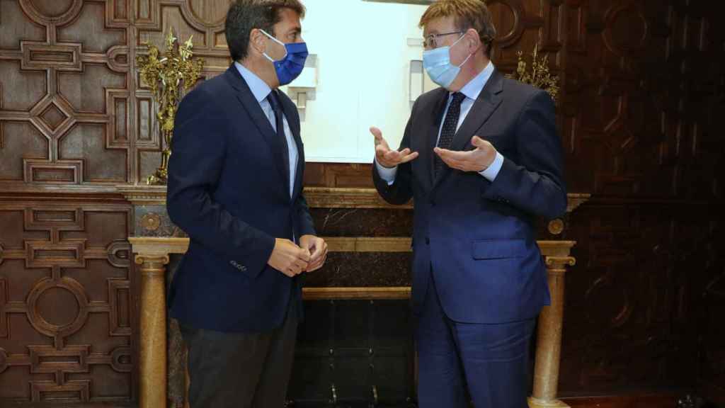 Carlos Mazón y Ximo Puig, durante su encuentro de este lunes. EE