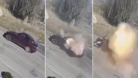 Momento en que el automóvil de la pareja explota tras los disparos del tanque ruso.