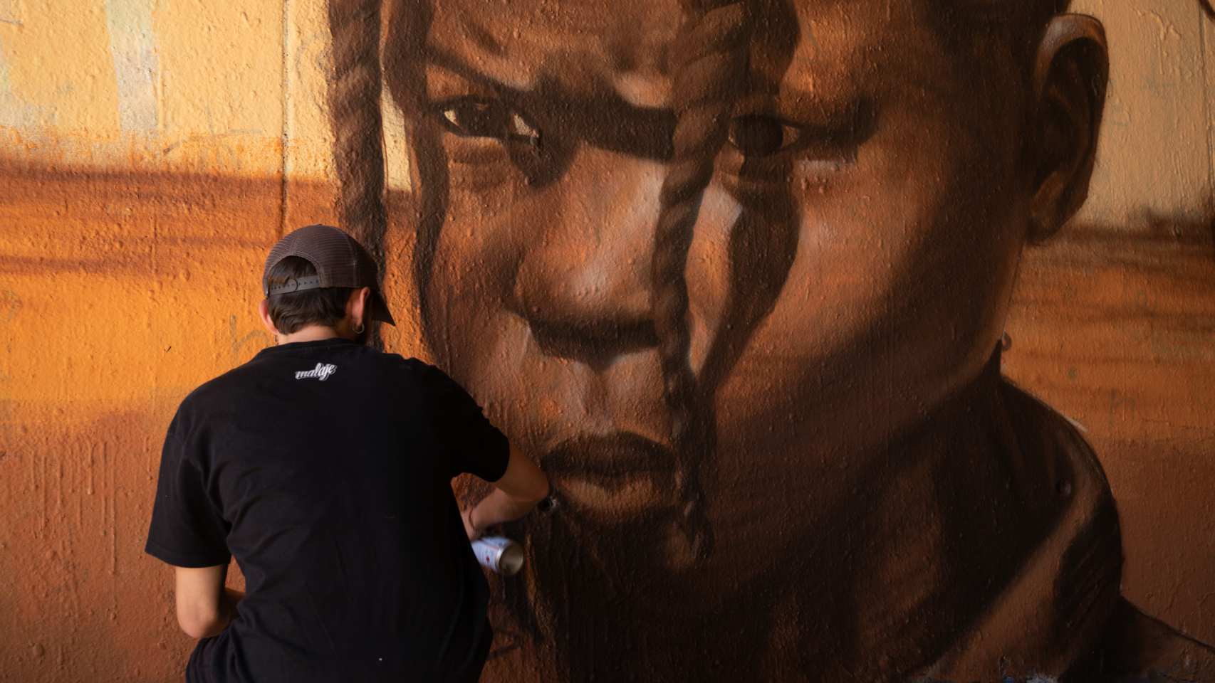 Una de las partes más elaboradas del mural es el retrato de un niño.