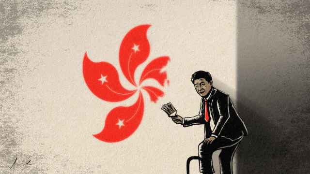 Xi Jinping borrando el escudo de Hong Kong