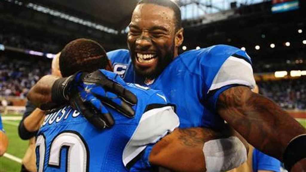 Calvin Johnson celebra una victoria con los Detroit Lions de la NFL