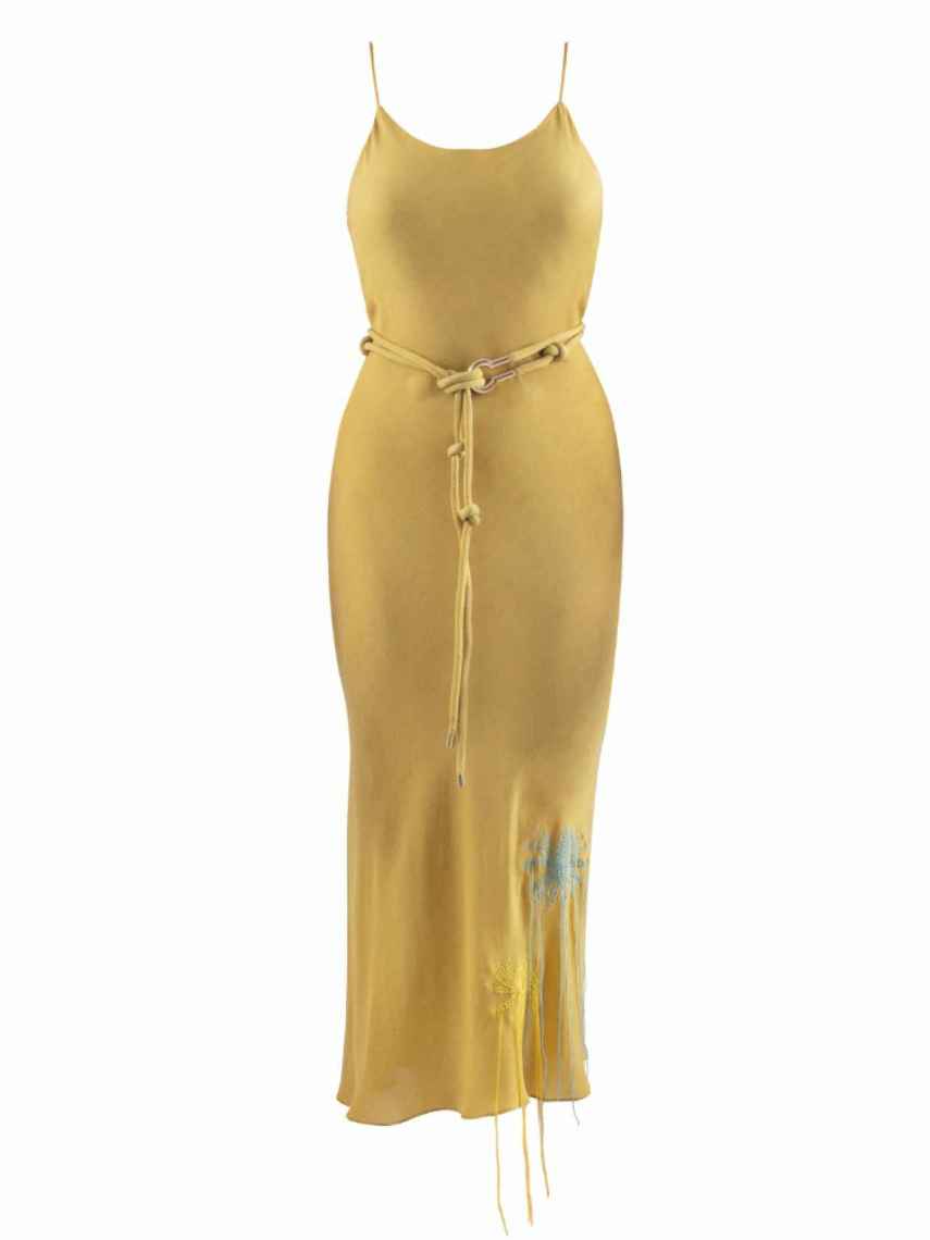 Marca tu cintura con este vestido amarillo. Precio: 195 euros.