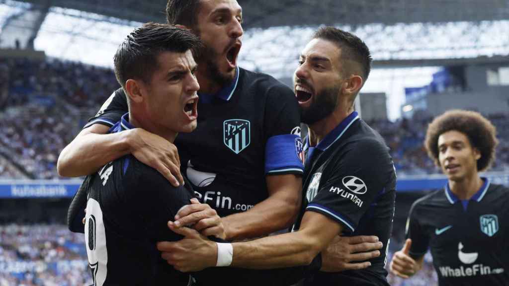 Álvaro Morata, Koke Resurrección y Yannick Carrasco celebran un gol del Atleti