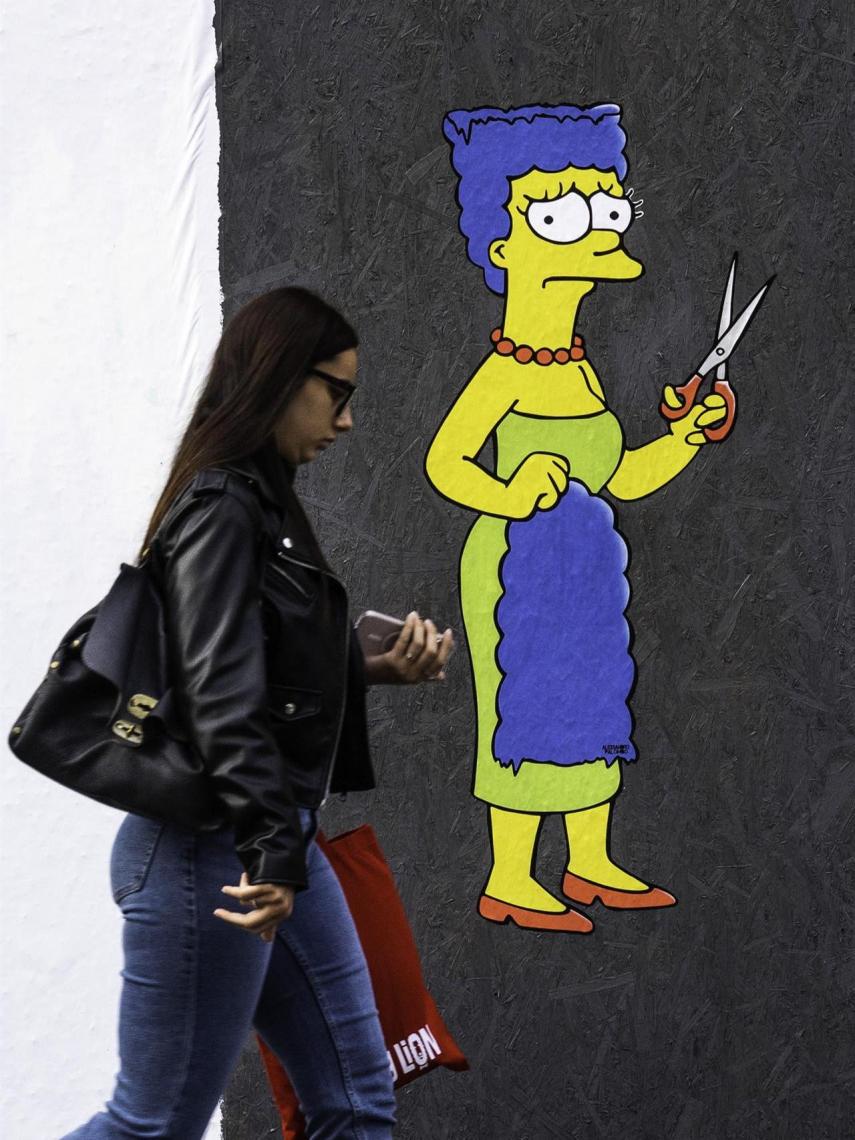 Un mural creado por el artista AleXsandro Palombo en Milán.