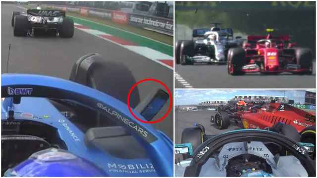 El retrovisor de Fernando Alonso descolgándose, a la izquierda