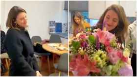 La ministra de Igualdad, recibiendo un ramo de flores en su despacho.