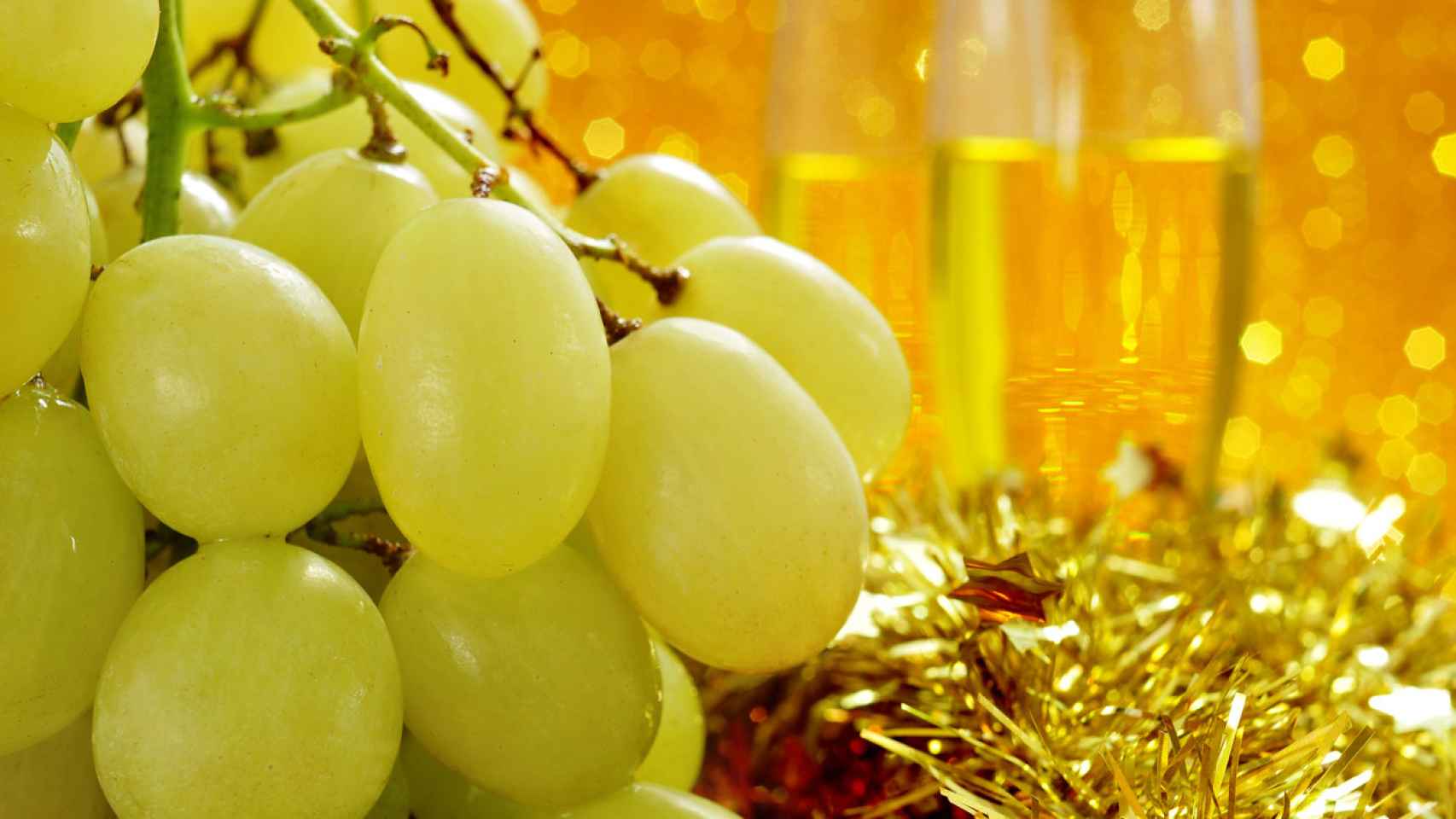 Conmemorativo dinero Contagioso Por qué en España tomamos 12 uvas en Nochevieja? El origen de esta tradición