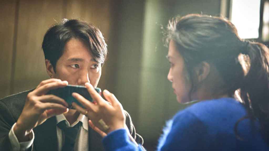 Park Hae-il y Tang Wei en un momento del filme