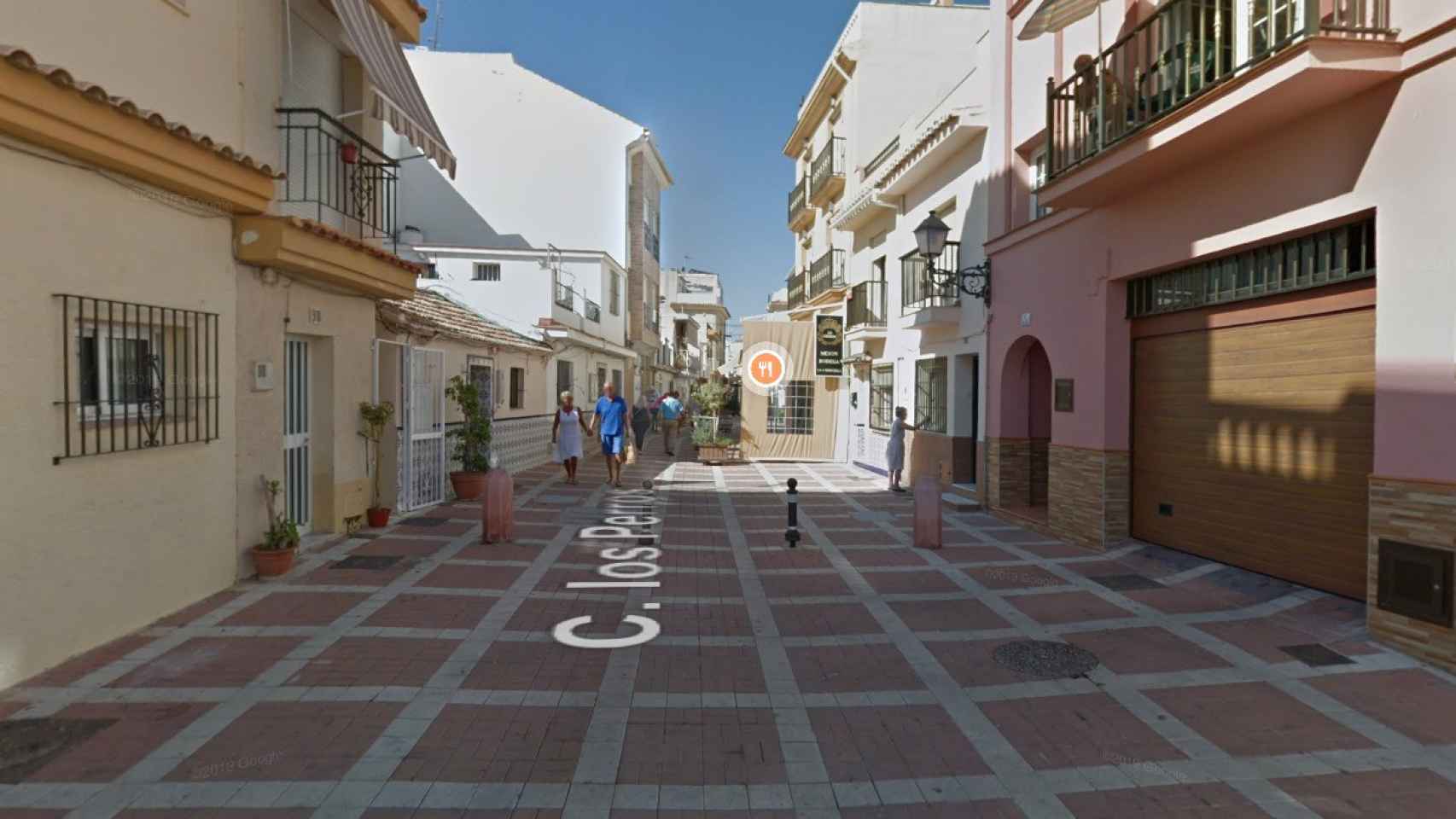 Imagen de la calle Los Perros, donde ha sido hallado el hombre muerto.
