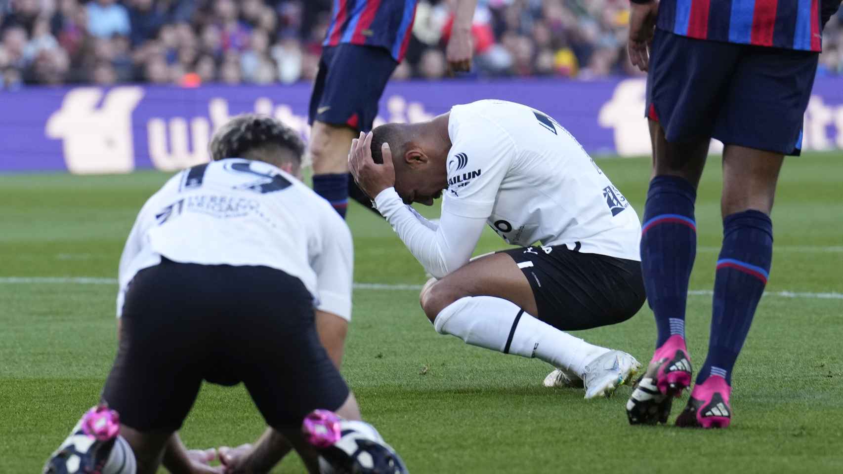 The Valencia players lament.