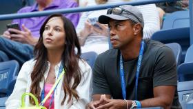 Tiger Woods junto a Erica Herman, su expareja.