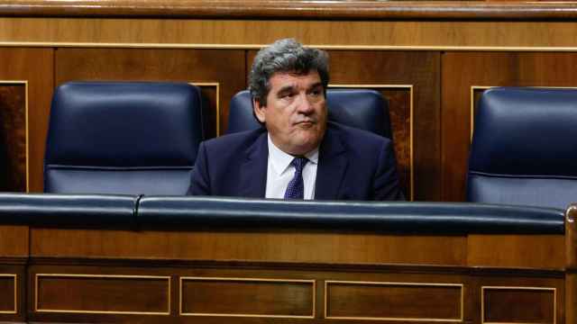 El ministro de Inclusión, José Luis Escrivá, este jueves en el Congreso de los Diputados durante el debate de su reforma.