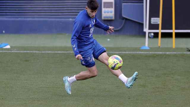 Cristian durante un entrenamiento con el Málaga CF