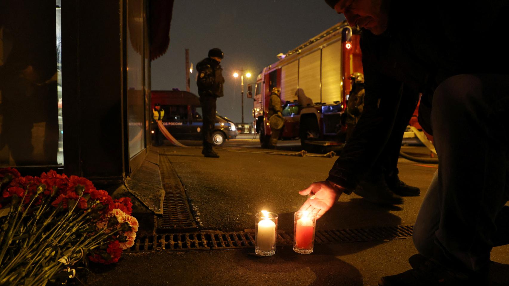 Russian citizens create an altar at the scene of the events.