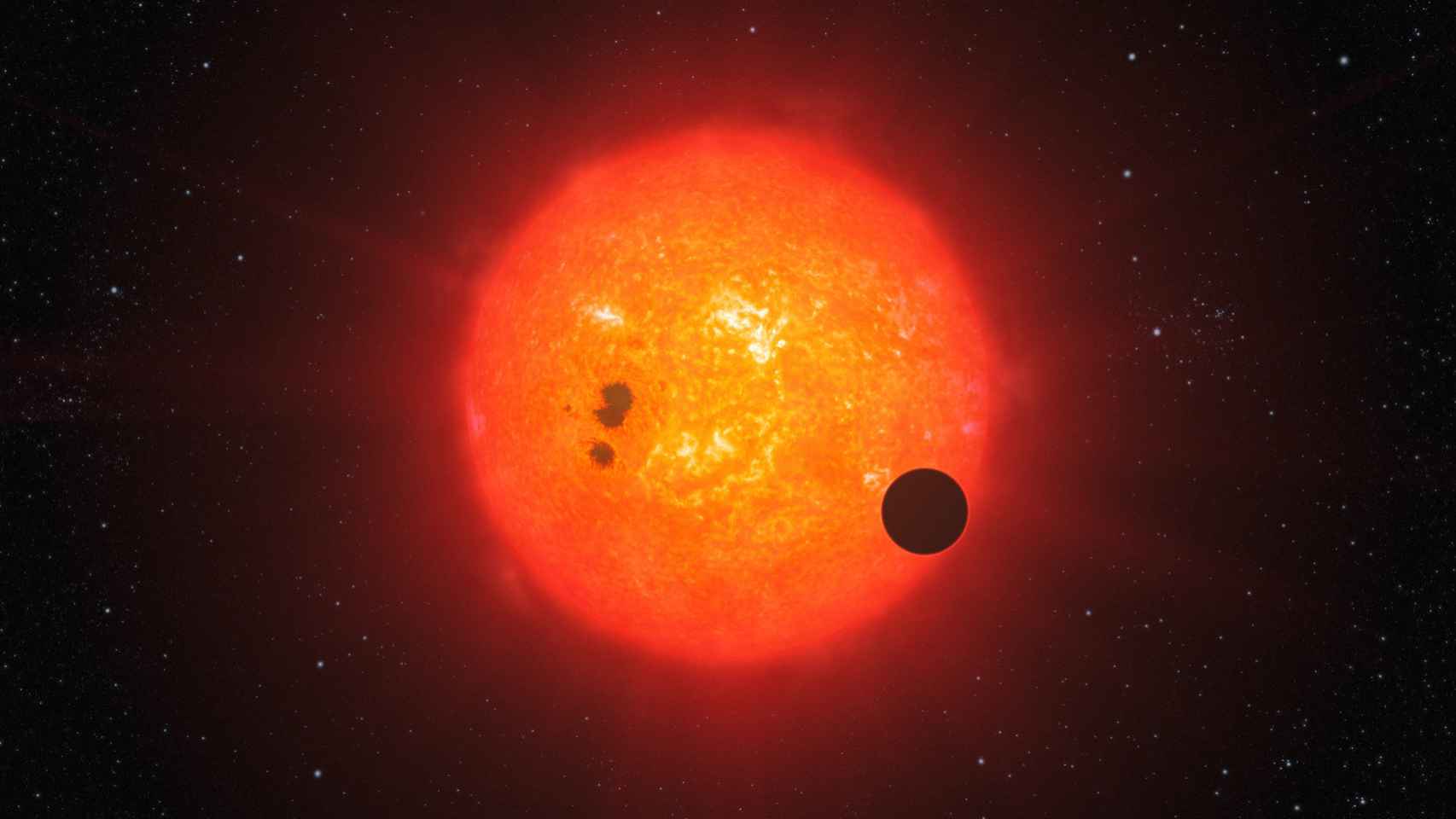 impresión artística que muestra cómo podría ser GJ 1214 b junto a su estrella.
